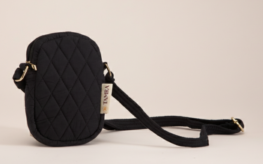 Black quilted crossbody bag with a strap 